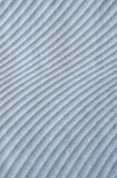 Many Parallel Embossed White Curves Slab Close — Stock Photo, Image