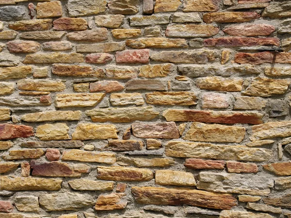 Bunte Steinmauer Nahaufnahme — Stockfoto