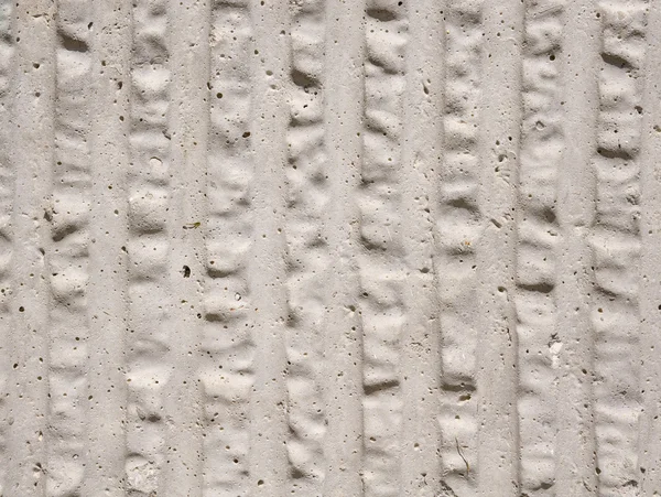 Płyty cementowe ecru porowatości pionowymi liniami — Zdjęcie stockowe