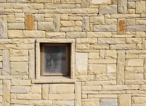 Pared de piedra con ventana de primer plano —  Fotos de Stock