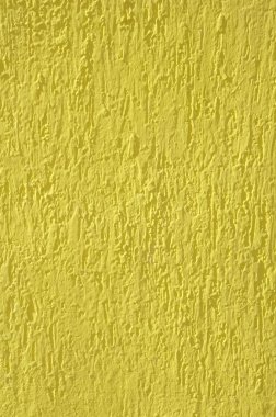 Sarı kabartma sıva duvar portre üzerinde