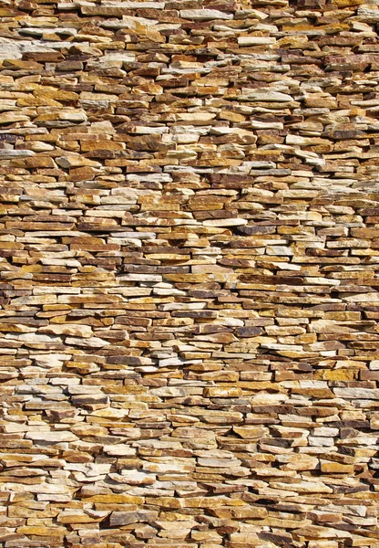Mur de pierre coloré gros plan — Photo