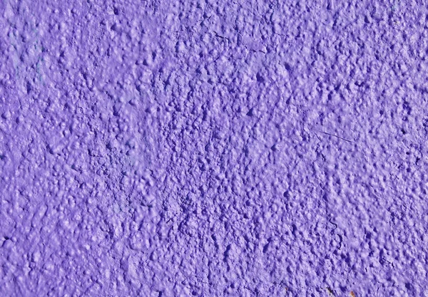 Decorative relief purple plaster on wall — Stock Photo, Image