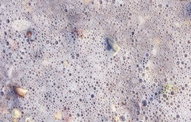 Dalga deniz köpük closeup ile