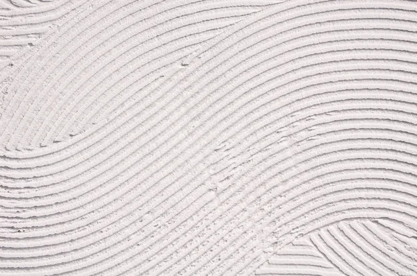 Белая декоративная рельефная штукатурка — стоковое фото