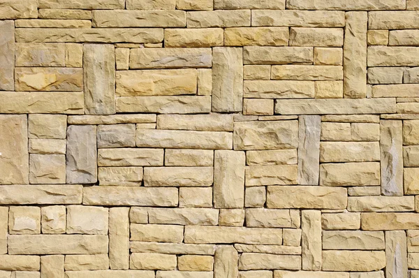 Nuove lastre di rivestimento in pietra sulla parete — Foto Stock