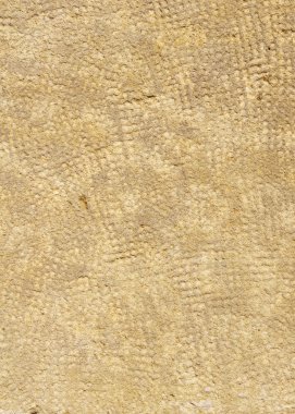 Duvarda işlenmiş taş portre 