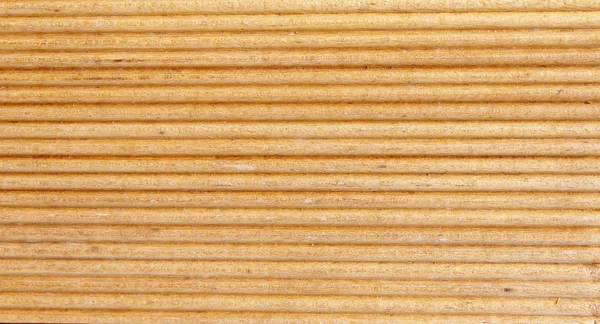 Drewniane lekkie rowki brązowy panelu zbliżenie — Zdjęcie stockowe