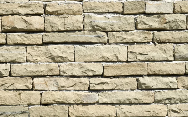 Nieuwe stenen muur close-up — Stockfoto