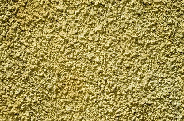 Gesso relevo amarelo decorativo na parede — Fotografia de Stock