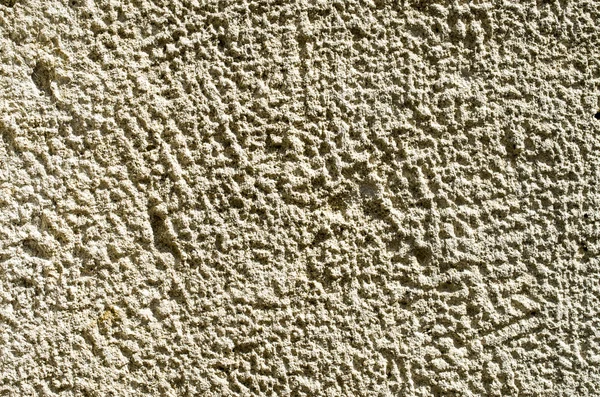 Processed stone closeup on wall — Stock Photo, Image