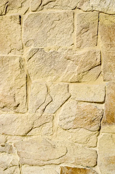 Yellow stone cladding plates on the wall — Stock Photo, Image