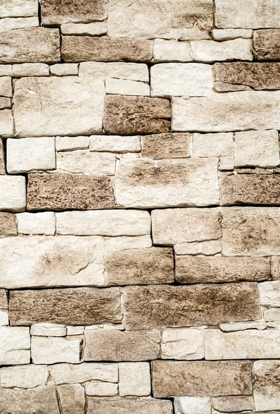 Decorative relief cladding slabs imitating stones on wall — Stock Photo, Image