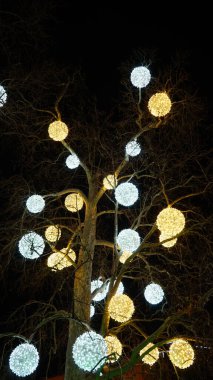 neon, glowing balls on a tree