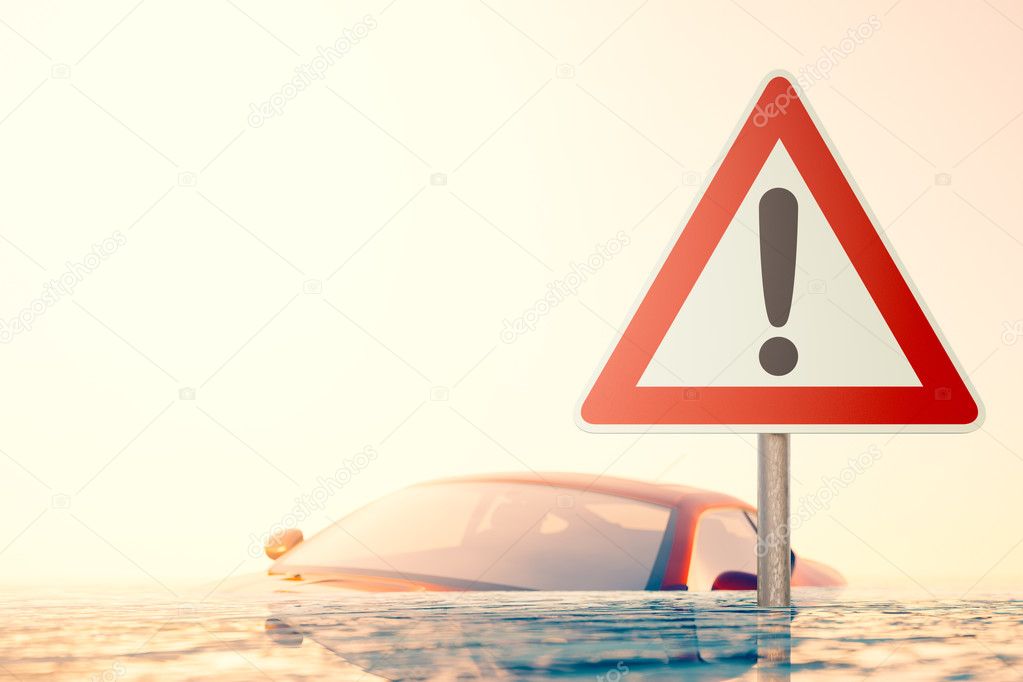 Caution Flood - warning sign standing in flood water in front of a flooded car
