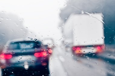 Bad Weather Driving on a Highway - Traffic Jam clipart