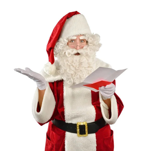 Weihnachtsmann liest seltsame Wunschliste — Stockfoto