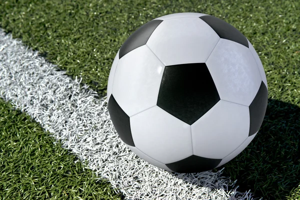 Computer generato pallone da calcio su un campo di calcio — Foto Stock