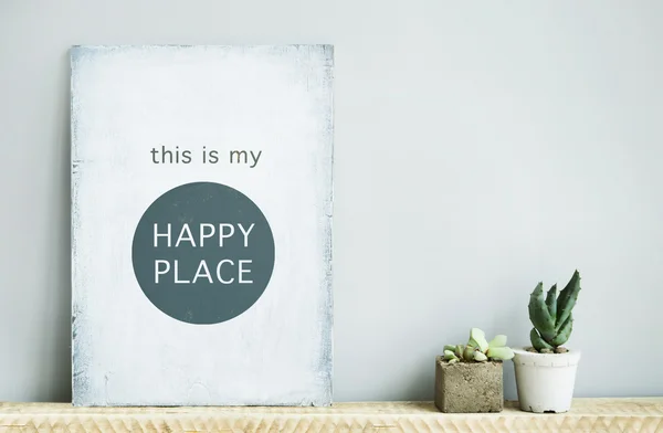 Old wooden rustic poster with quote with succulents in concrete — Stock Photo, Image