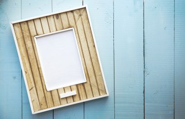 eski retro çerçeve vintage mavi ahşap arka plan üzerine