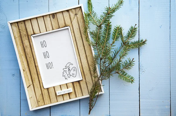 Groet kerstkaart frame over oude vintage houten pagina — Stockfoto