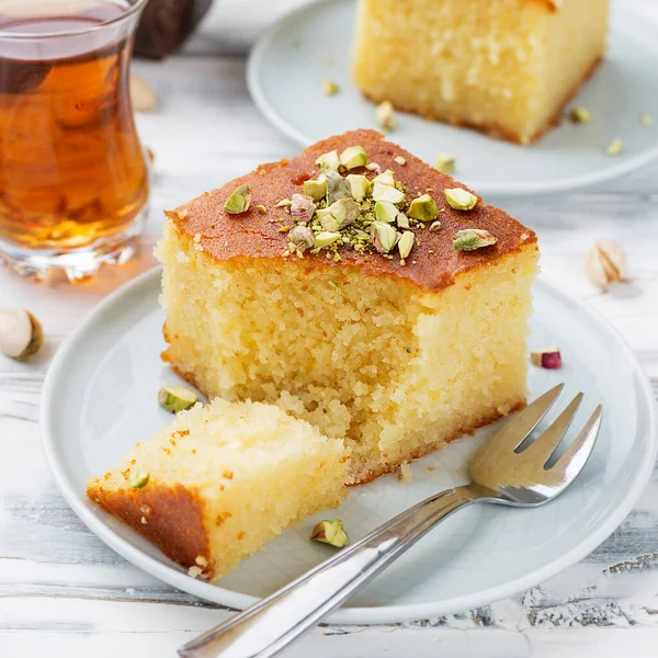 Revani - sweet semolina cake with pistachio, traditional turkish dessert