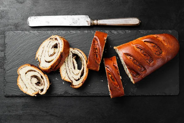 Sliced Poppy Roll Cake Serving Board — Fotografie, imagine de stoc