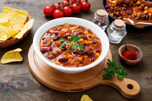 Traditional mexican dish chili con carne with minced meat and red beans.
