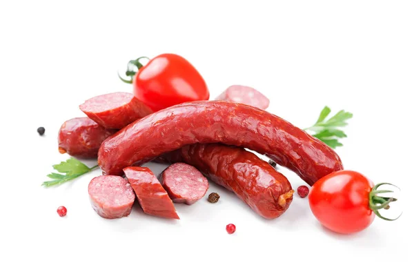 Smoked sausages with spice and parsley.isolated on white background