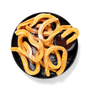 Beyaz arka planda izole edilmiş şeker ve çikolata soslu Churros..