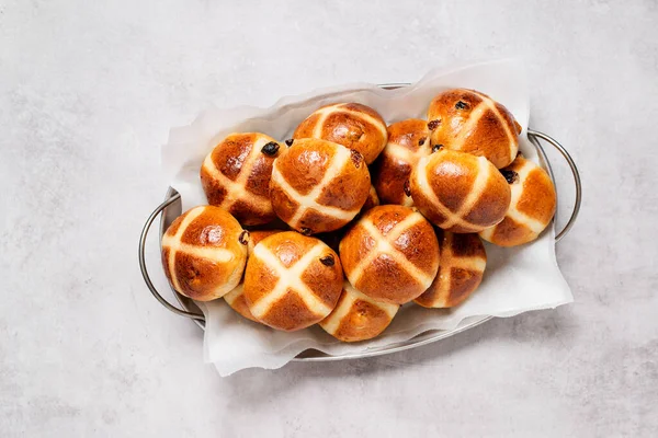 Traditional english cuisine, fresh hot cross buns for easter breakfast. top view