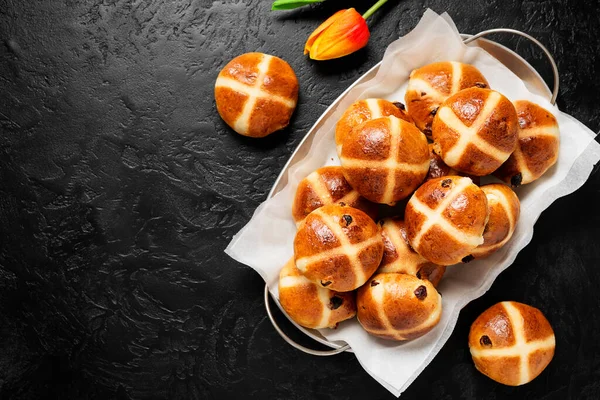 Traditional english cuisine, fresh hot cross buns for easter breakfast. top view. space for text