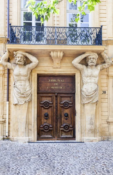 Entrance of the commercial court with statues in Aix en Provence — Stock Photo, Image