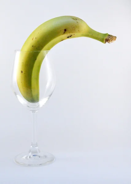 Plátano en un vaso de cristal — Foto de Stock