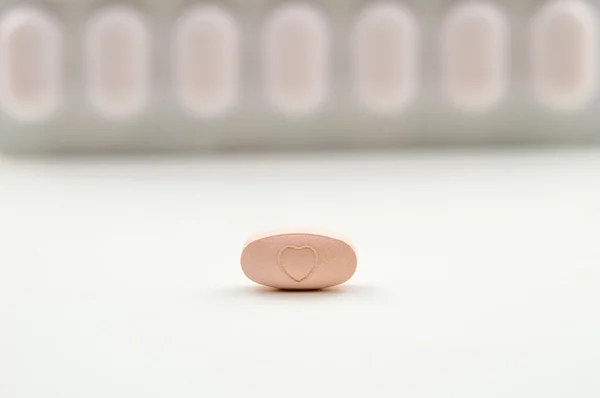 Pink tablet — Stock Photo, Image