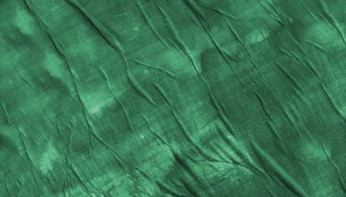 Arkaplanı buruşuk kağıtlarla kaplanmış..