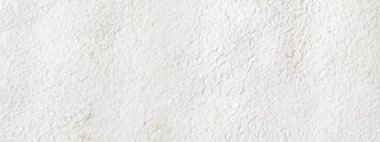 Arkaplanı buruşuk kağıtlarla kaplanmış..