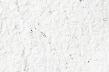 Arkaplanı buruşuk kağıtlarla kaplanmış..