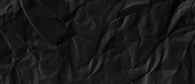 Arkaplanı buruşuk kağıtlarla kaplanmış..