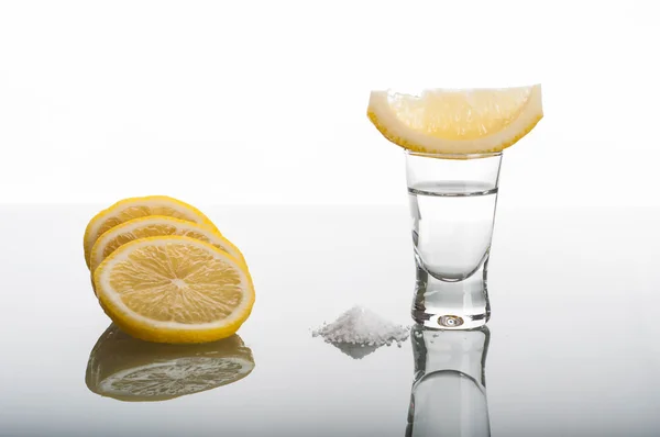 Shot of tequila with lemon and salt — Stock Photo, Image