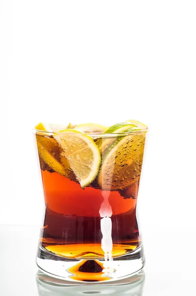Glass of cola with sliced lemon — Stock Photo, Image
