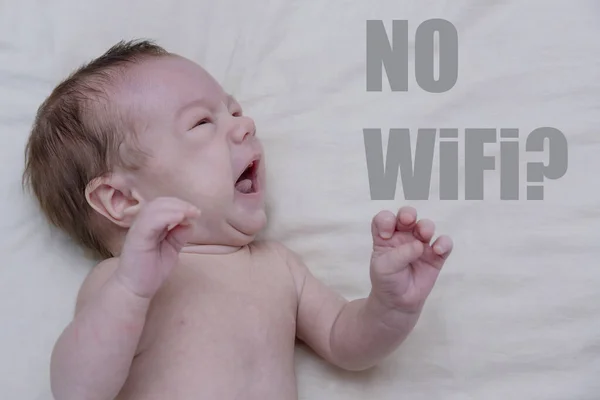 Crying newborn boy with text No Wi-Fi. Business concept.