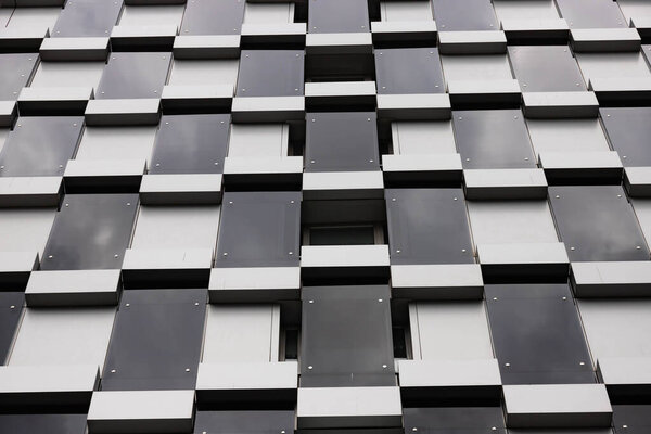 Building architecture details, facade design. Modern building Black and gray.