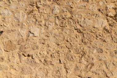 Kahverengi taş desen arkaplanının yakın plan görüntüsü