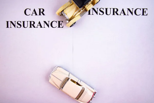 stock image Close-up of two toy car and inscription CAR INSURANCE