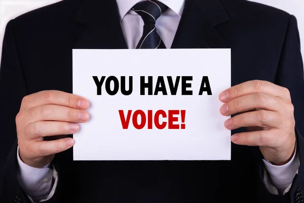Empresário Segurando Cartão Com Texto Você Tem Uma Voz — Fotografia de Stock