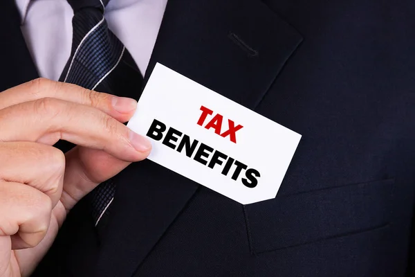 Businessman Putting Card Text Tax Benefits Pocket — Stock Photo, Image