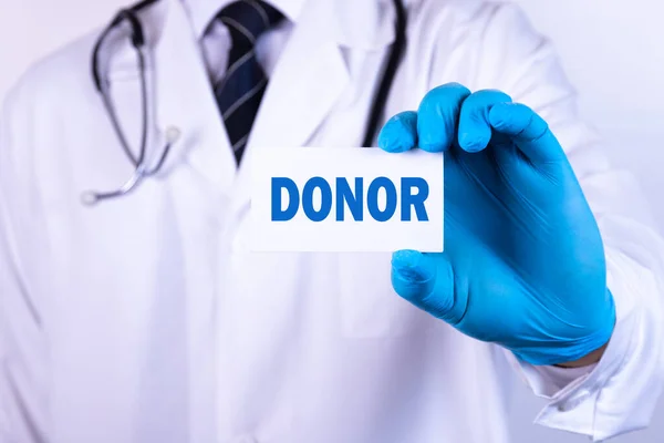 Doctor Holding Card Text Donor Medical Concept — Stock Photo, Image