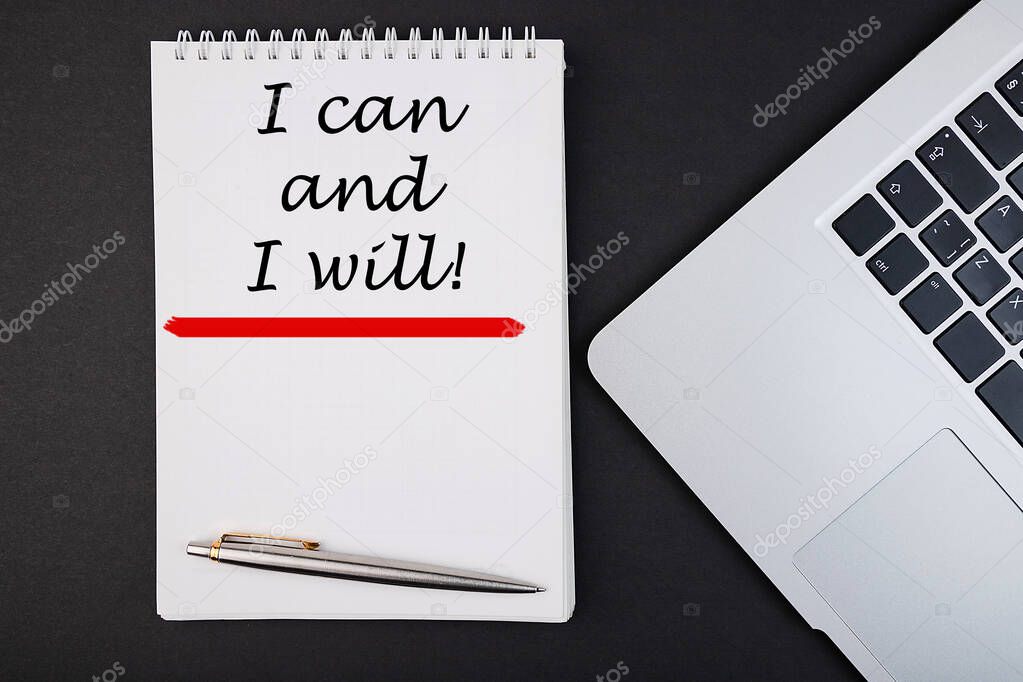 Business concept - Top view notebook writing I Can And I Will. Inspirational Quotes and Business Motivational Quote