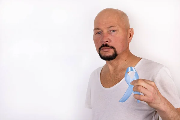 Man Holds Blue Ribbon Background His Shirt Medical Prostate Cancer — Stock Photo, Image